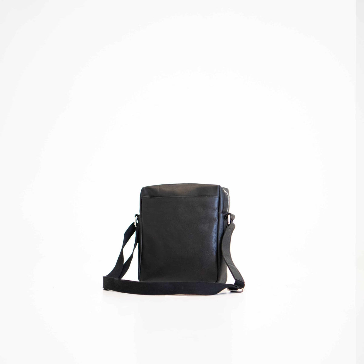 3. Studio shot of Papillon Small Shoulder Bag No. 37 in black leather, back view showing sleek design