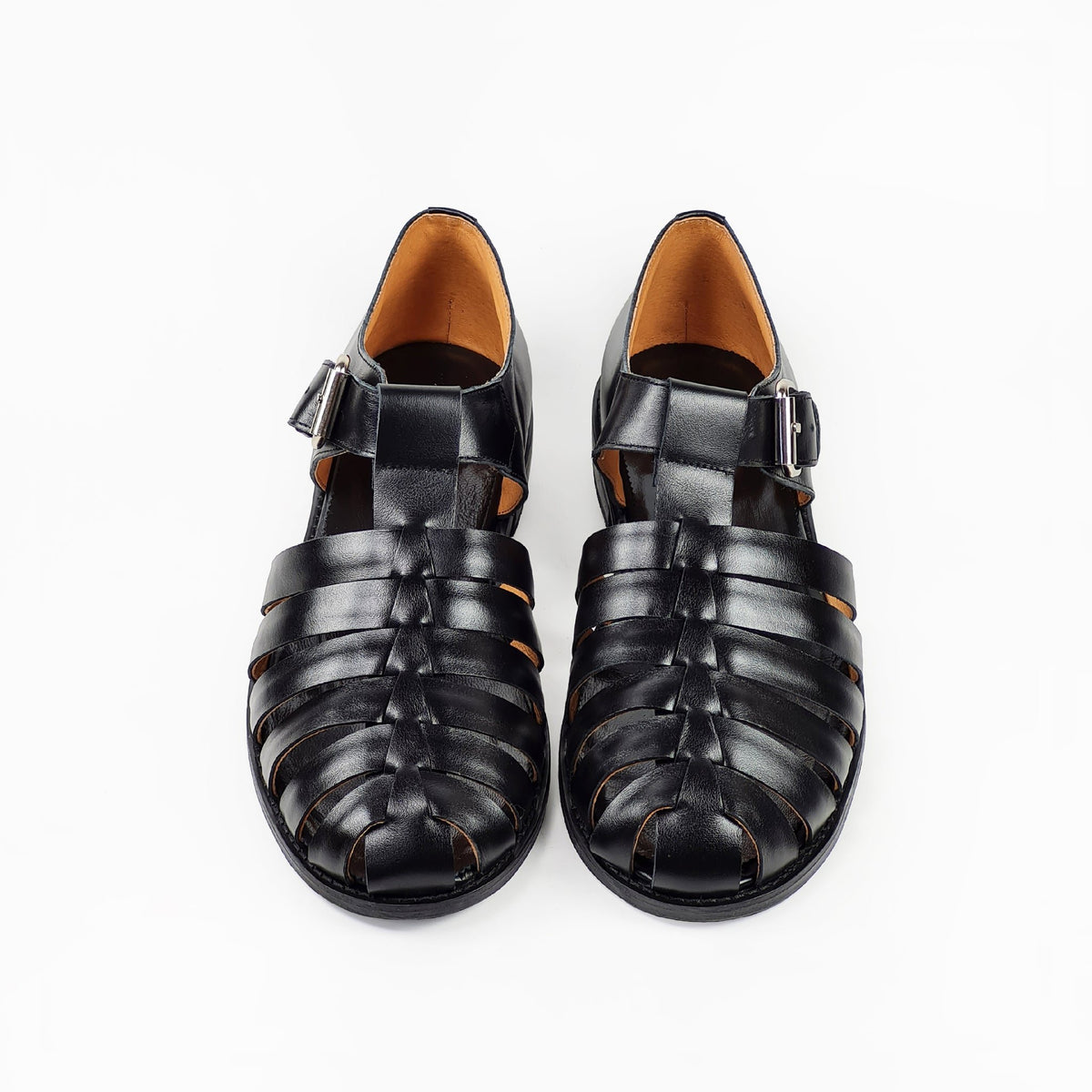 4. Top view of men's black leather fisherman sandals by Daz Studio, highlighting round toe design