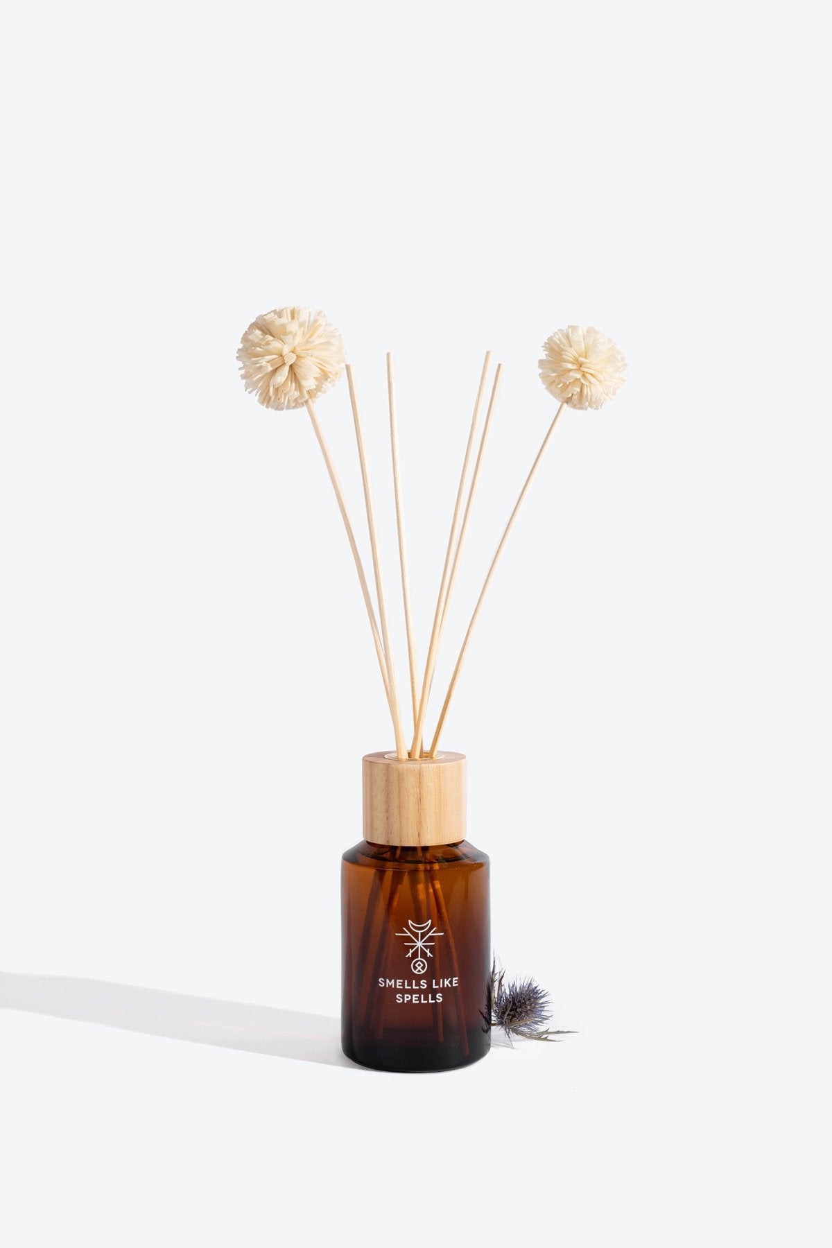 2. Smells Like Spells HEIMDALLR home perfume in brown glass bottle with reed diffuser sticks