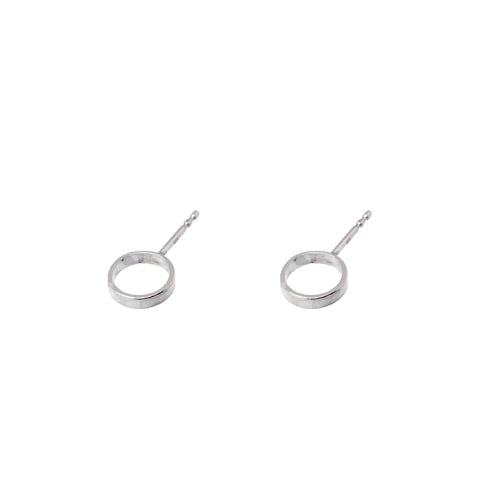 2. Studio image of Maarja Palu CIRCLE earrings in silver, featuring small circular design
