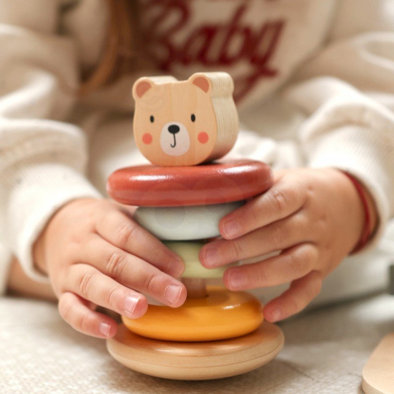 11. Child assembling pyramid bear from Woopie Let's Go Green 3in1 toy set