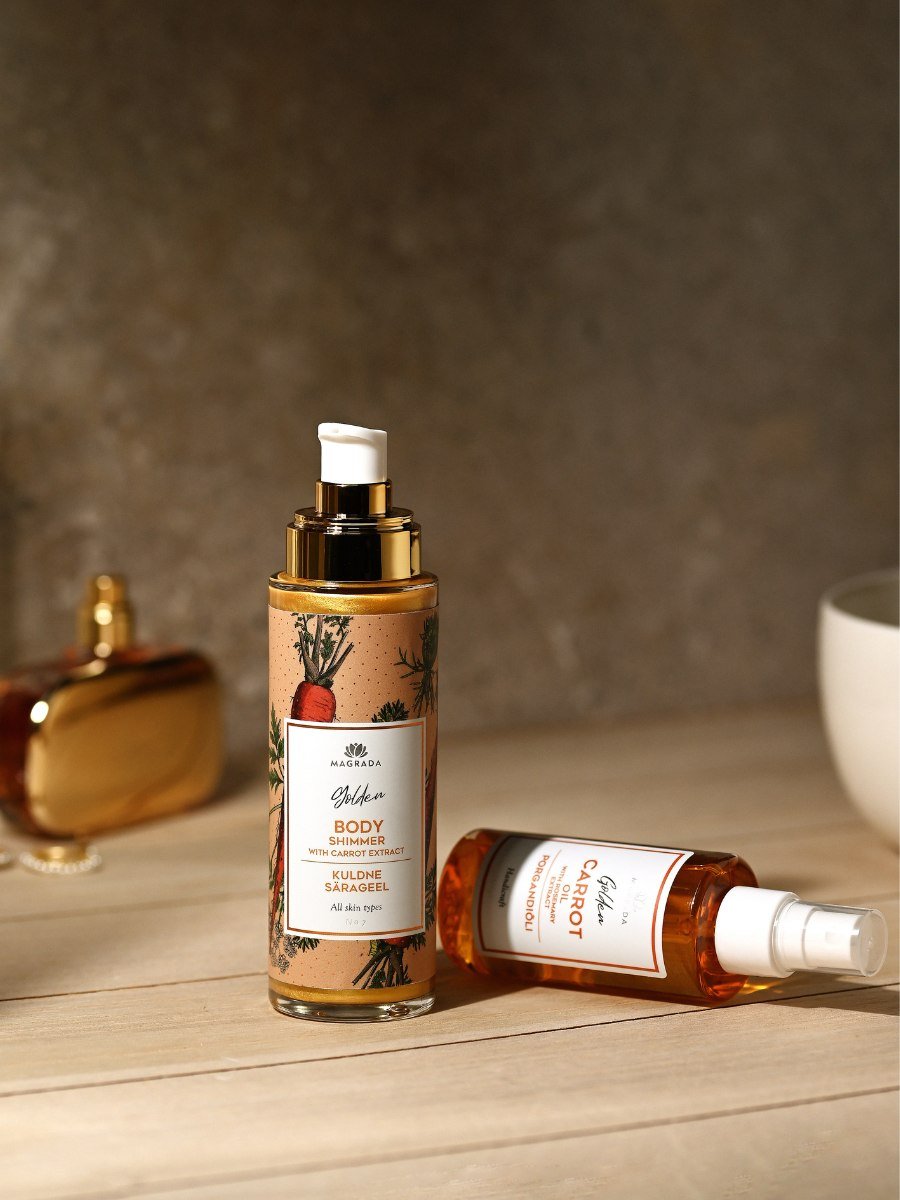 5. Magrada Golden Shimmer Gel with Carrot Extract and additional product on wooden surface in studio setting
