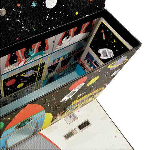 3. Interior view of space-themed playbox showing detailed space station graphics and compartments