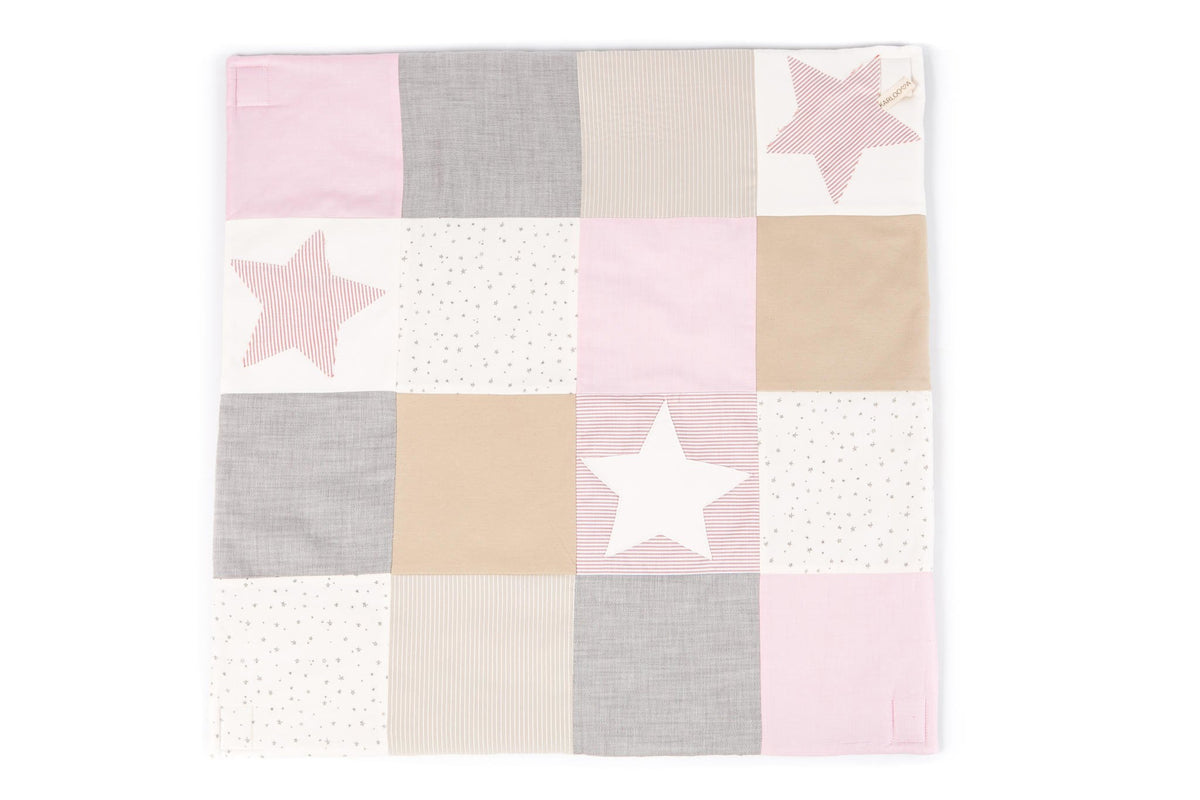 4. Flat lay of Karloova pink patchwork baby activity mat with star patterns