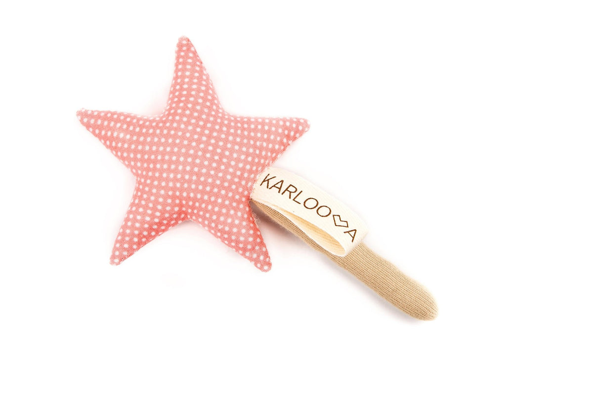 2. Pink star-shaped Karloova magic wand with polka dots and branded handle on white background