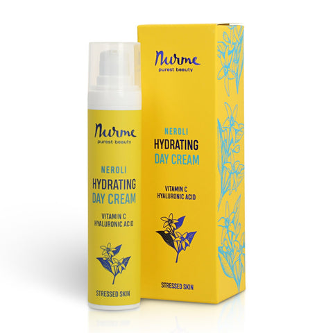 1. Nurme Neroli Hydrating Day Cream held by a woman with sunflower in background