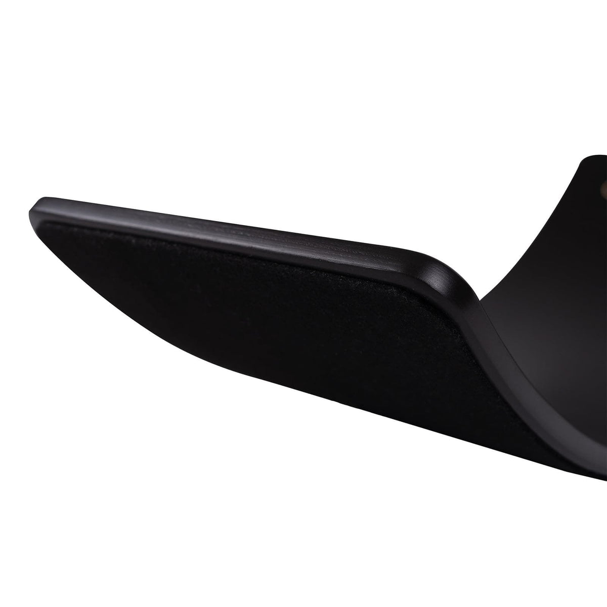 3. Close-up of black balance board edge, highlighting smooth curve