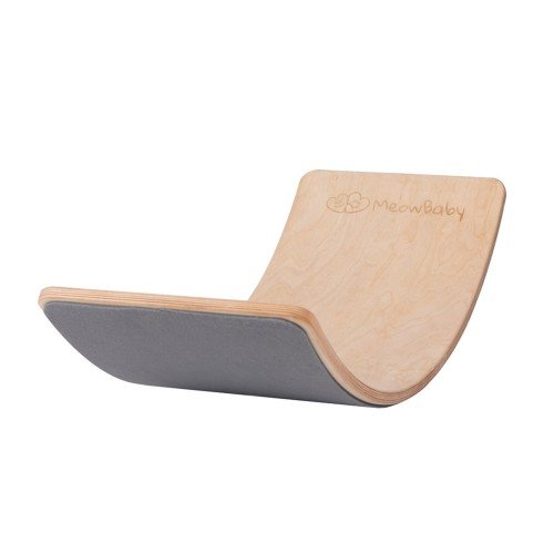 2. Beige balance board with grey felt underside, shown in studio setting