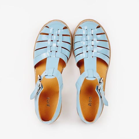 5. Close-up of handmade leather fisherman sandals in light blue by Daz Studio, showing strap-covered front