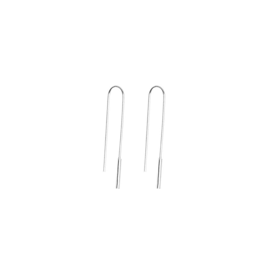 3. Studio image of Maarja Palu's U-shaped silver earrings, showcasing minimalist design