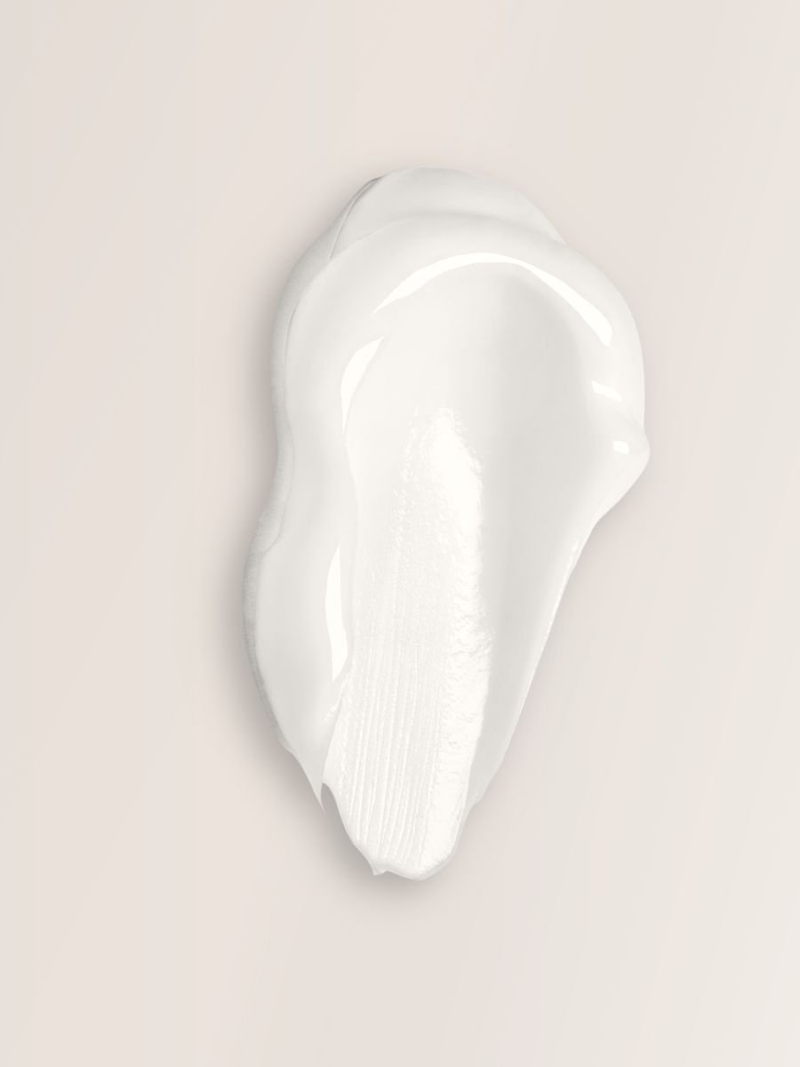 4. Magrada Organic Cosmetics Rhubarb Hair Mask box and leaflet on stone, emphasizing botanical design