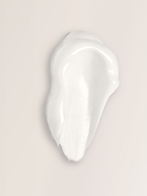 4. Magrada Organic Cosmetics Rhubarb Hair Mask box and leaflet on stone, emphasizing botanical design