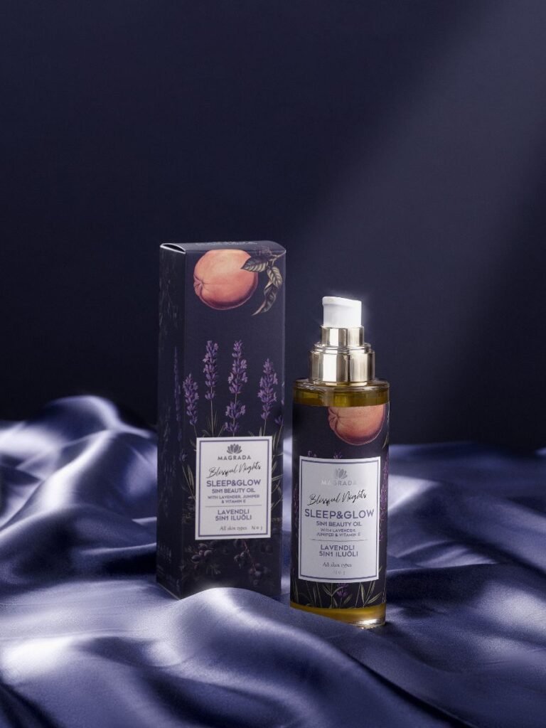 5. Magrada Sleep&Glow body oil with packaging on silky fabric, emphasizing luxury