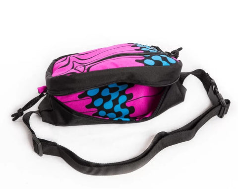 3. Top view of Drinbags pink waist bag highlighting spacious main compartment and strap