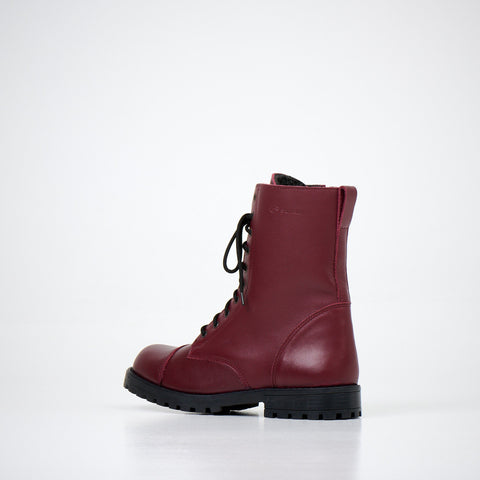 4. Unisex burgundy winter boots by Samelin, side view showing lace-up design and fur lining