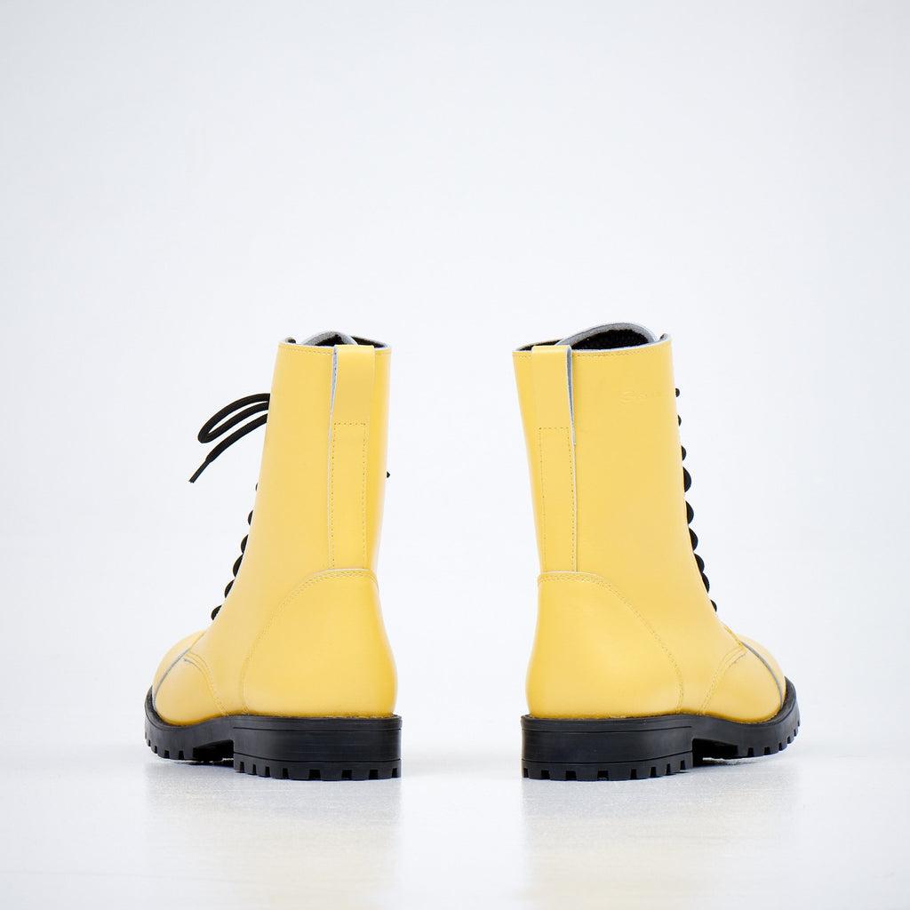 3. Back view of Samelin 511 Yellow boots showing the punk-style design and sturdy construction