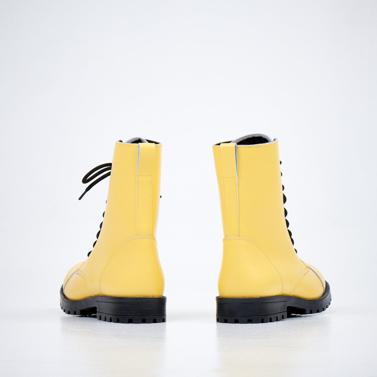 3. Back view of Samelin 511 Yellow boots showing the punk-style design and sturdy construction