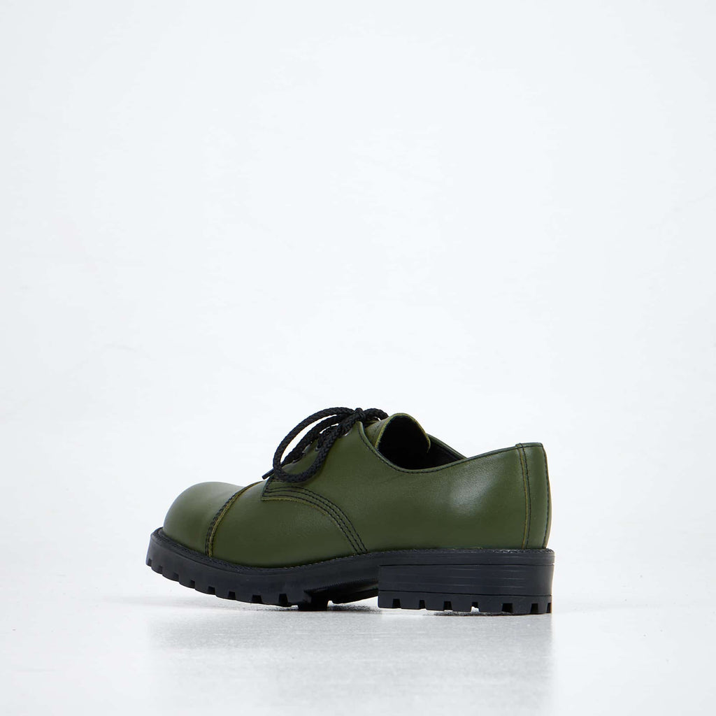 2. Side view of unisex green Samelin Green Widgets shoes, highlighting genuine leather upper and durable outsole