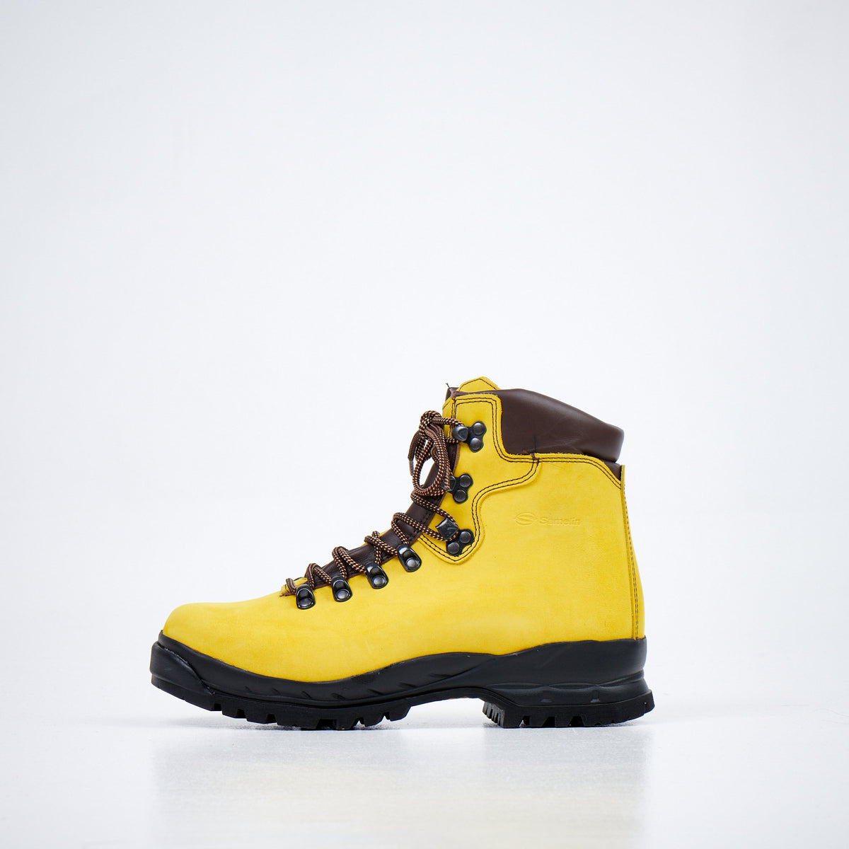 4. Side profile of Samelin 5531 Ginestra unisex hiking boots in yellow nubuck leather with brown detailing, studio setting