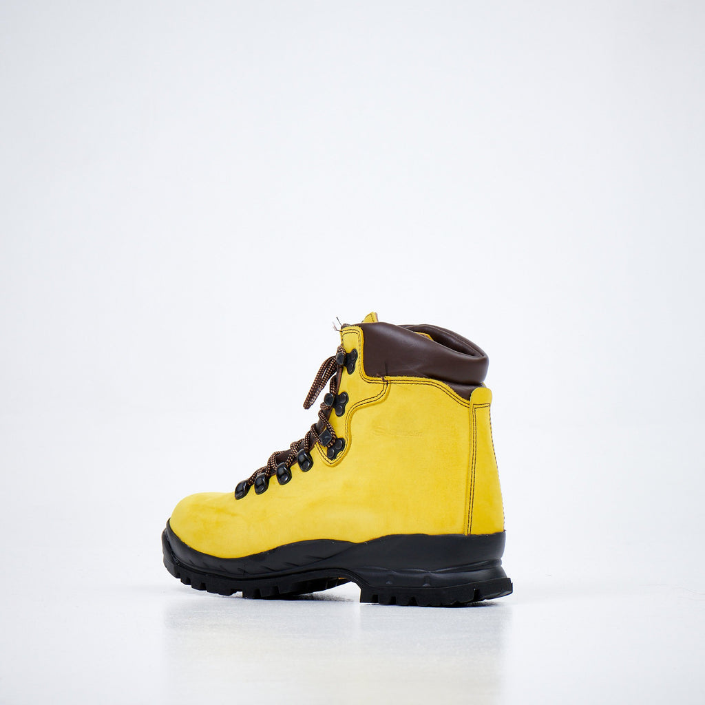 2. Side view of Samelin 5531 Ginestra unisex hiking boots in yellow nubuck leather with brown collar, studio setting