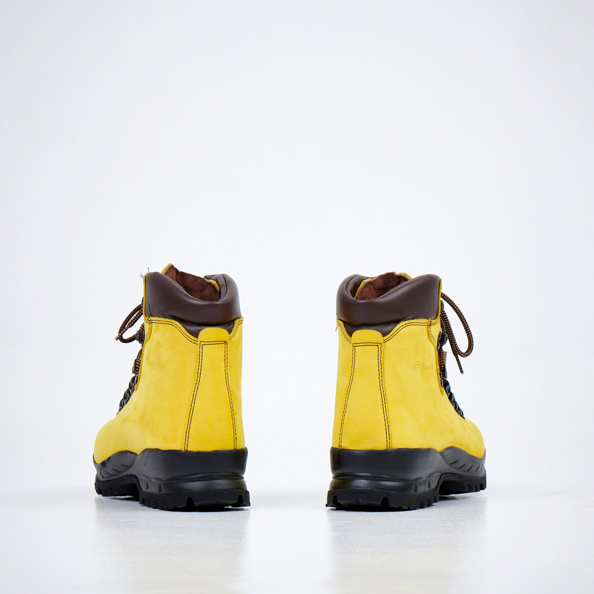 1. Back view of Samelin 5531 Ginestra unisex hiking boots in yellow nubuck leather with brown accents, studio setting