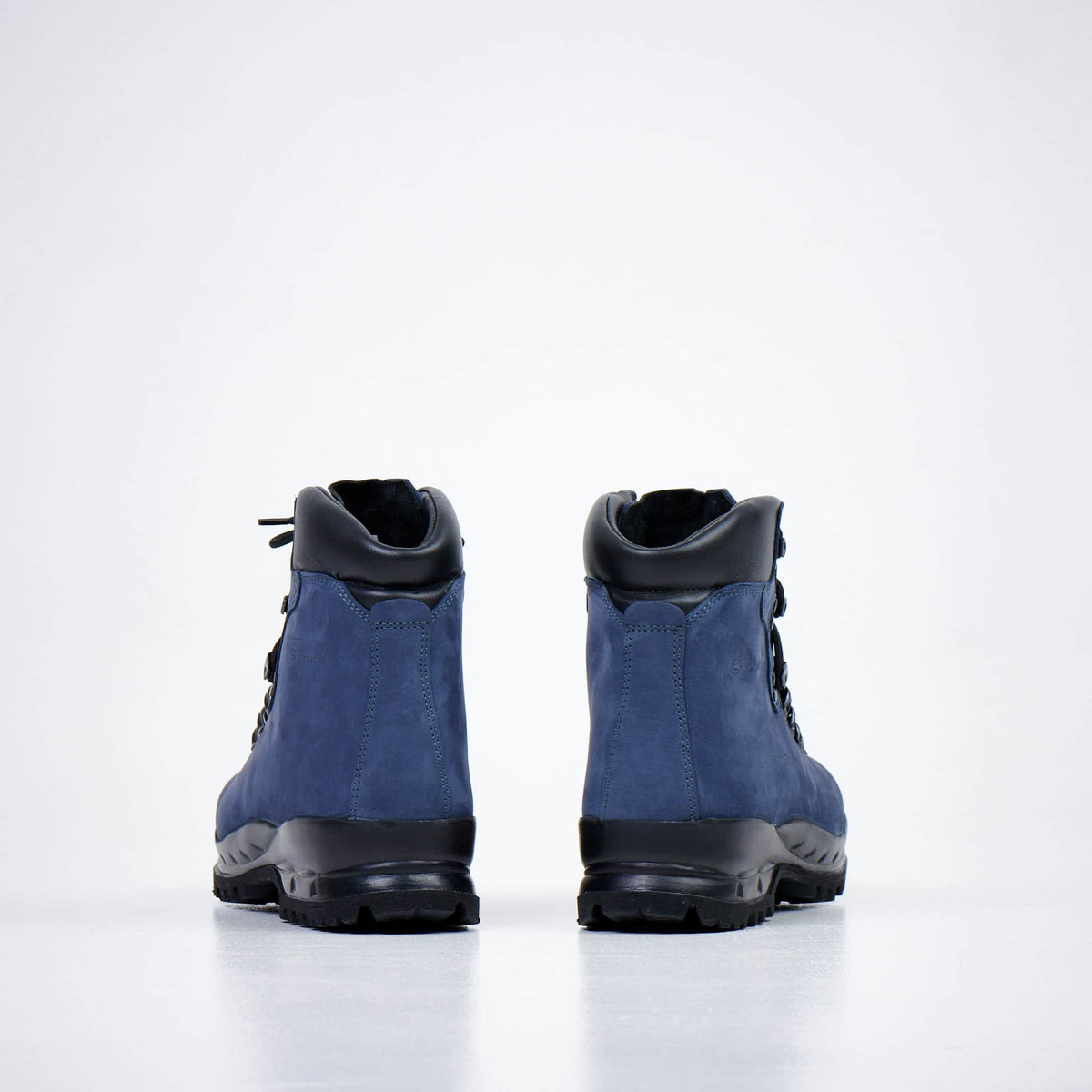 2. Back view of Samelin 5531 navy hiking boots with Vibram sole, studio shot