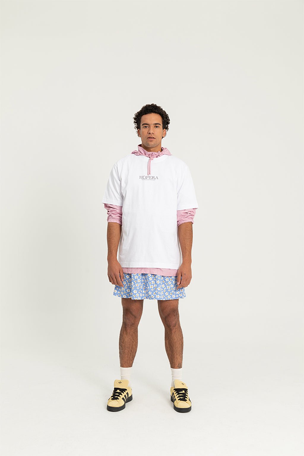 7. Front view of male model wearing Hopera's 'Gentils Propos' t-shirt, featuring minimalist design