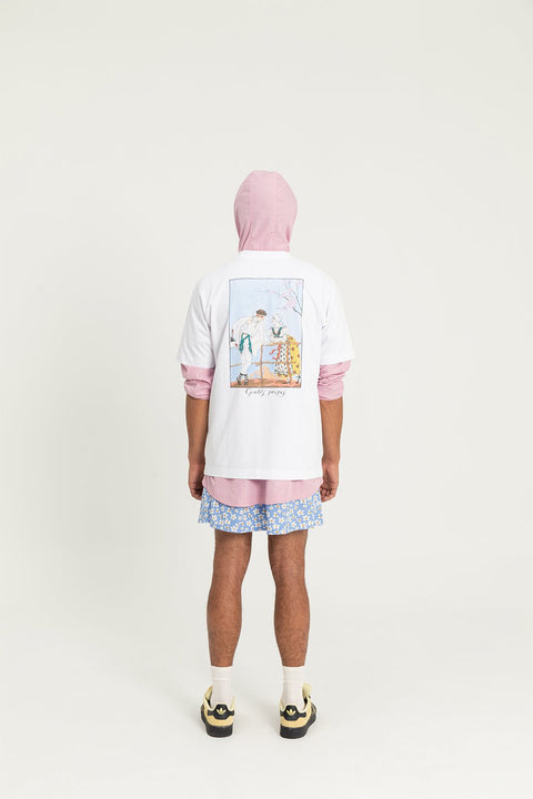 5. Studio shot of male model in Hopera's 'Gentils Propos' t-shirt, highlighting back illustration