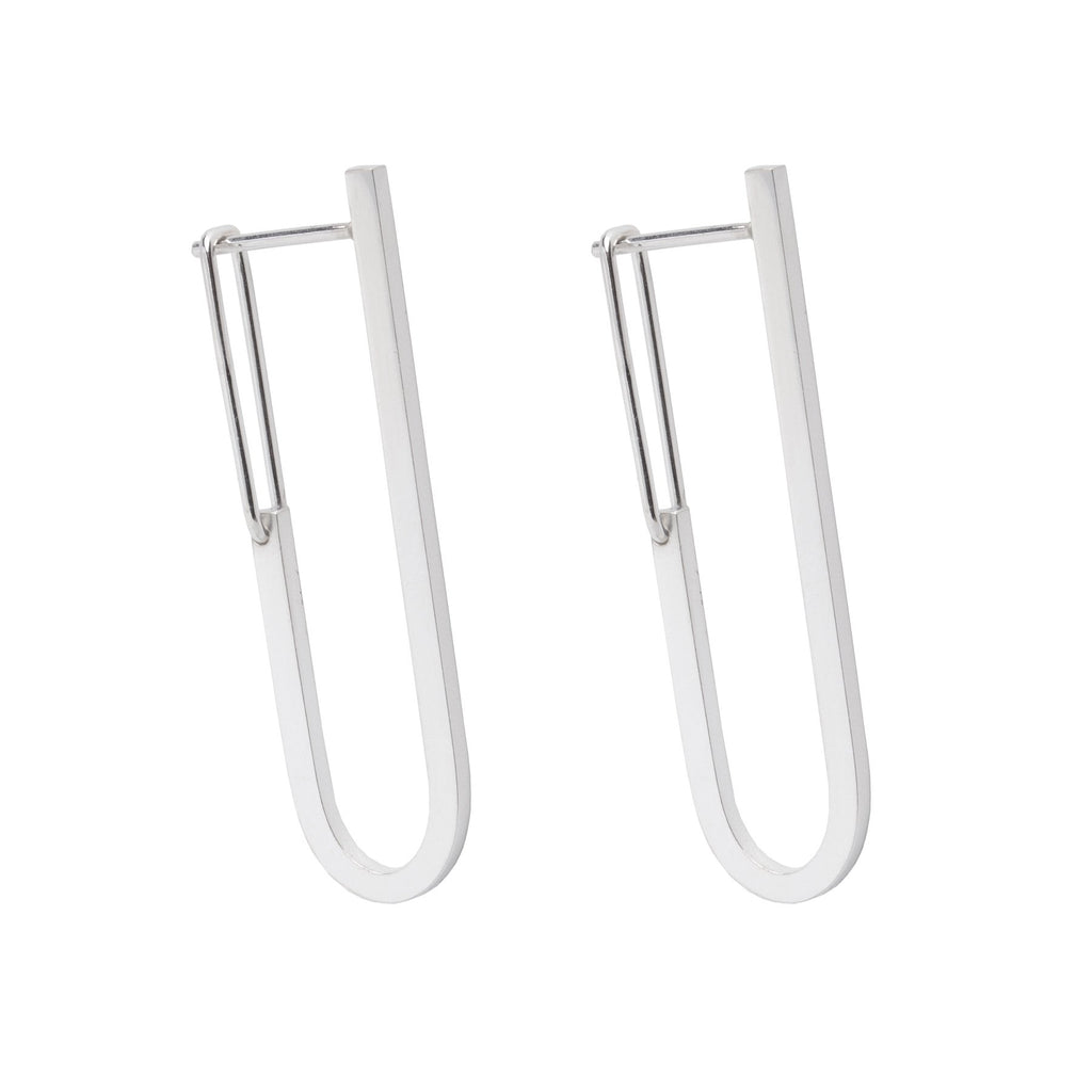 2. Studio image of Maarja Palu TECTONICS earrings, featuring elongated U-shaped silver rods