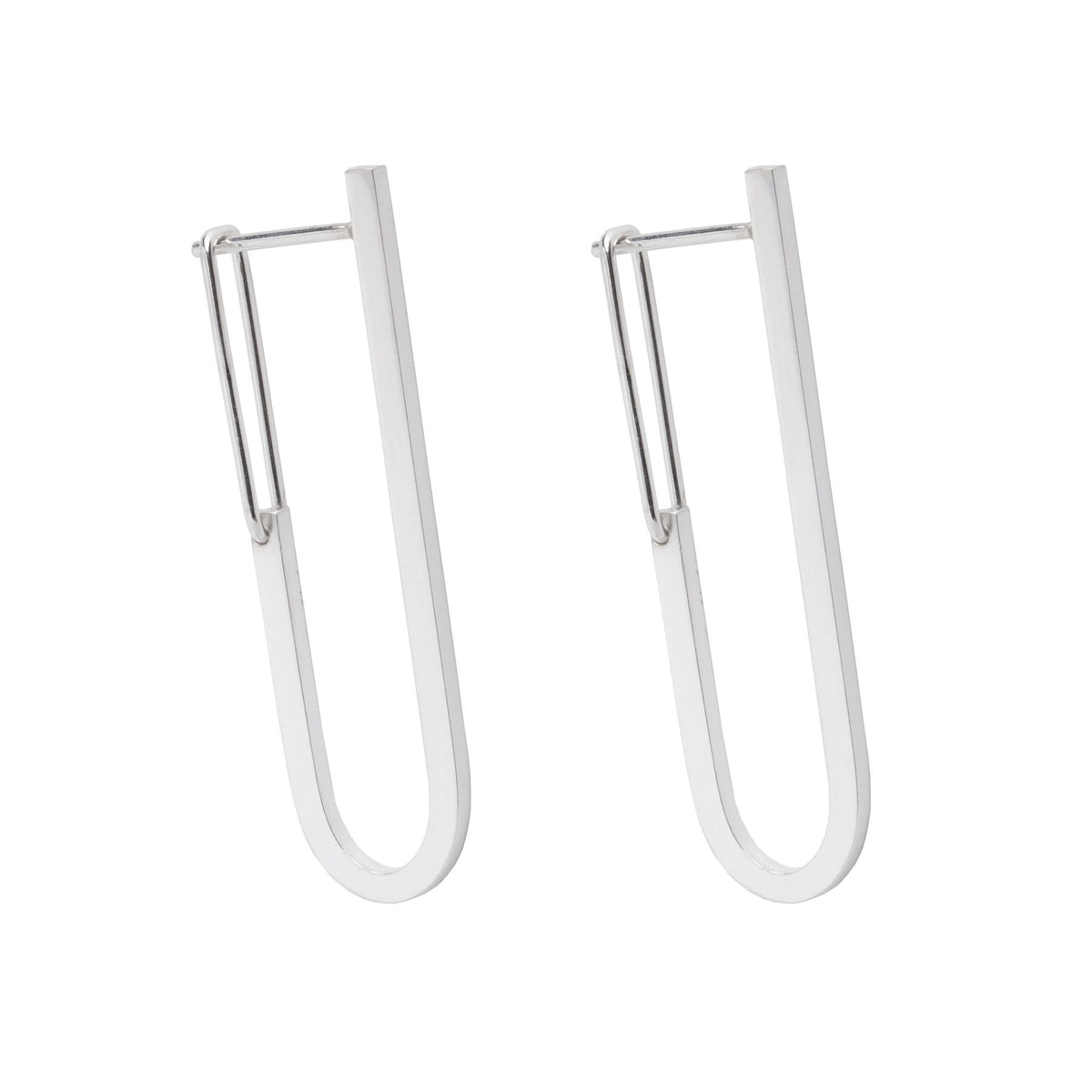 2. Studio image of Maarja Palu TECTONICS earrings, featuring elongated U-shaped silver rods