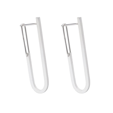 2. Studio image of Maarja Palu TECTONICS earrings, featuring elongated U-shaped silver rods
