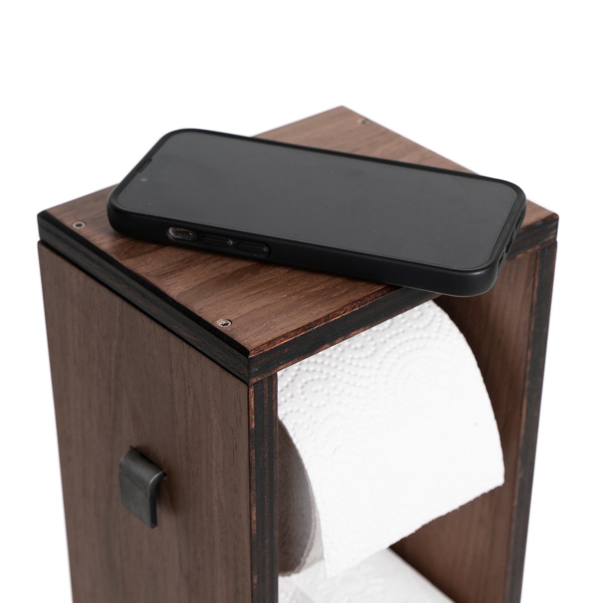 4. Top view of wooden toilet paper holder with smartphone placed on top, highlighting multifunctional use