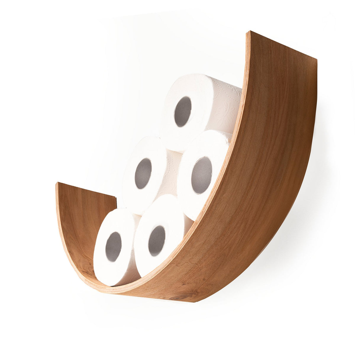 2. Studio shot of wooden toilet paper holder in smile shape holding five rolls, made from Baltic birch plywood, side view