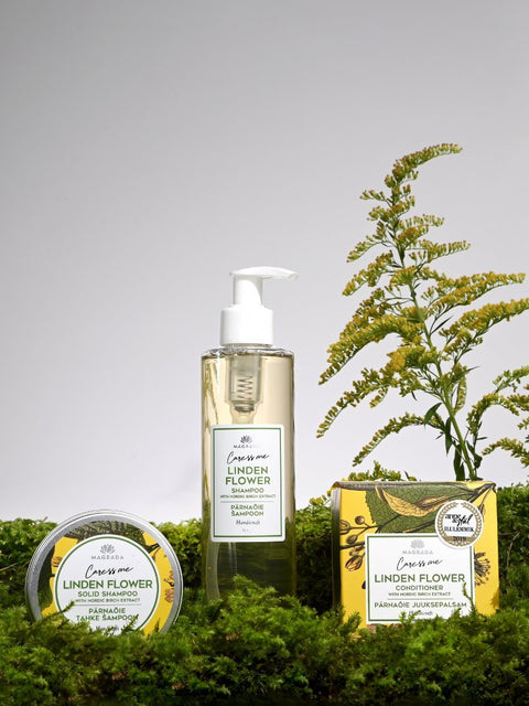 3. Magrada Organic Cosmetics Linden Flower hair care set including conditioner, shampoo, and solid shampoo, displayed in a natural setting