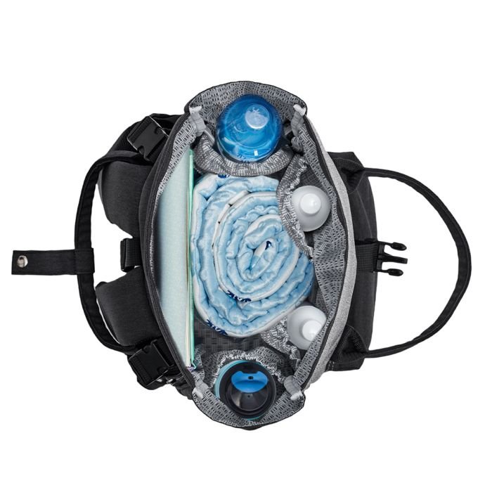 7. Top view of open Kinderkraft Moonpack diaper backpack showing organized interior with bottles and diapers