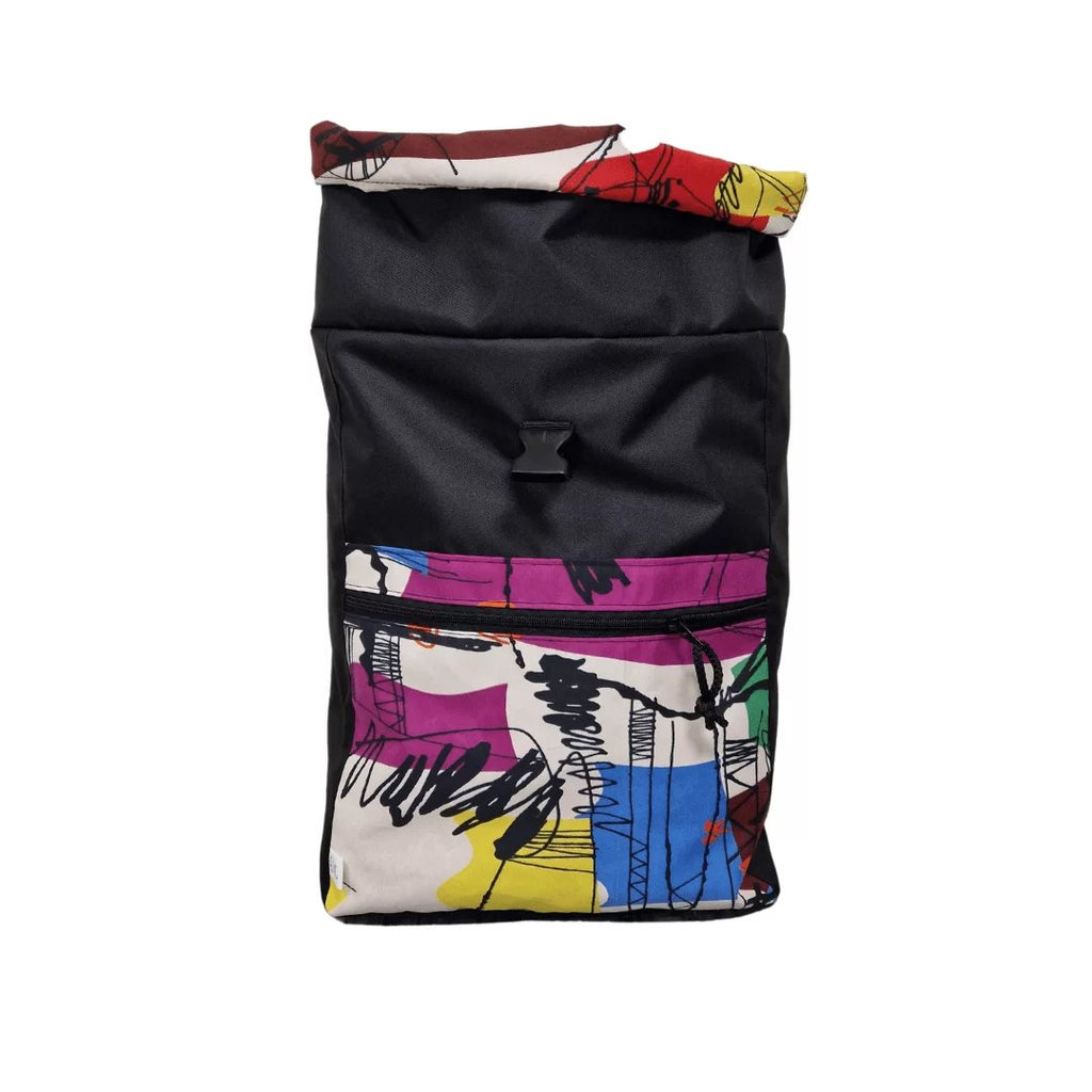 3. Drinbags PAINT waterproof backpack in black with colorful front pocket, shown unrolled, studio shot