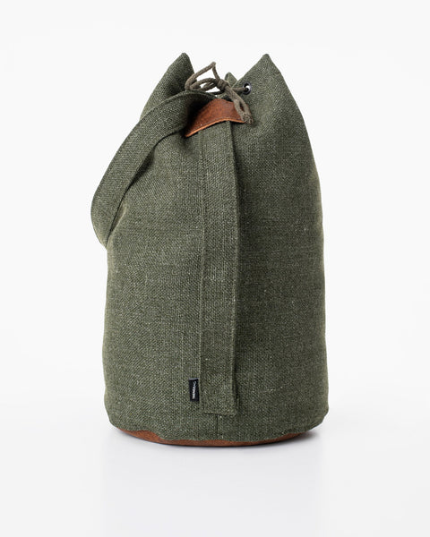 4. Side view of Trendbag Märss upcycled bag in green, highlighting faux leather details