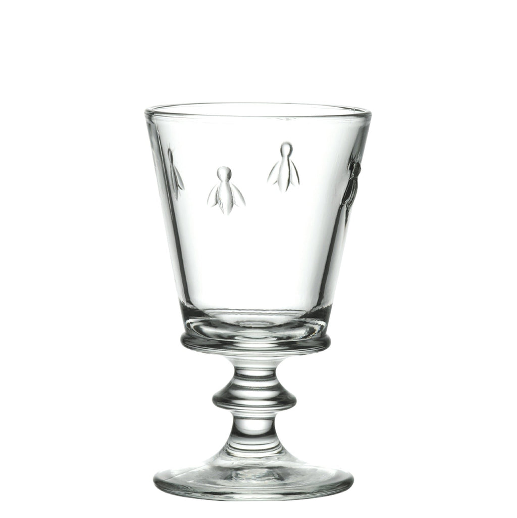 3. Studio shot of a single La Rochère Bee glass with embossed bee design on a white background