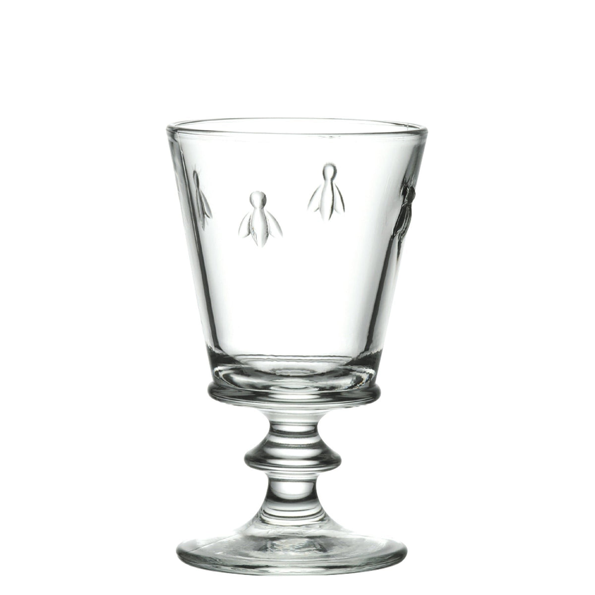 3. Studio shot of a single La Rochère Bee glass with embossed bee design on a white background