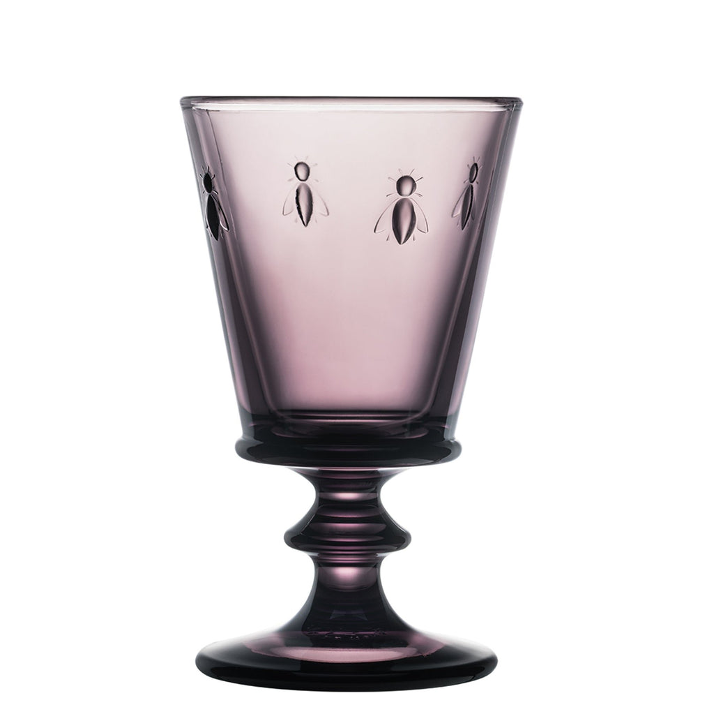 3. Single eggplant purple La Rochère Bee Glass with embossed bee motif on a white background