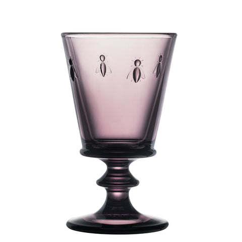 3. Single eggplant purple La Rochère Bee Glass with embossed bee motif on a white background