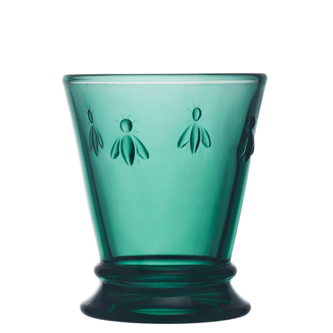 5. Single La Rochère Bee Water Glass in emerald with embossed bee motif, shown in studio lighting