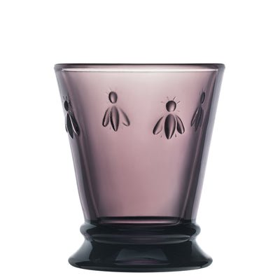 4. Single La Rochère Bee Water Glass in eggplant with embossed bee motif, shown in studio lighting