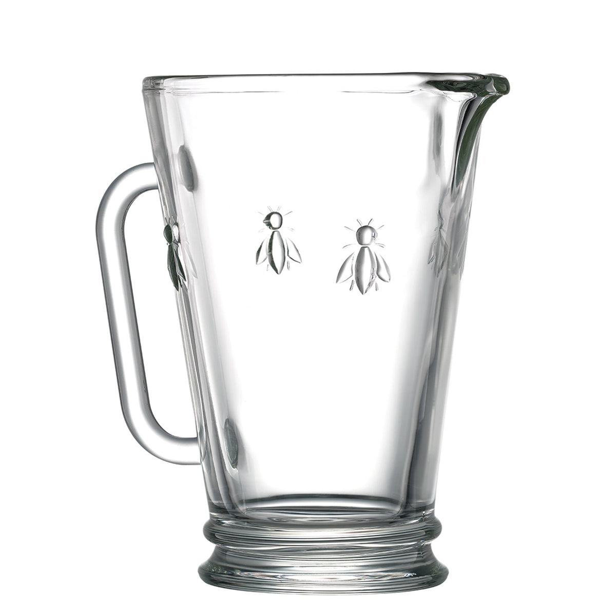2. Transparent glass jug with embossed bee design, featuring a sturdy handle and spout, from La Rochère's Abeille collection