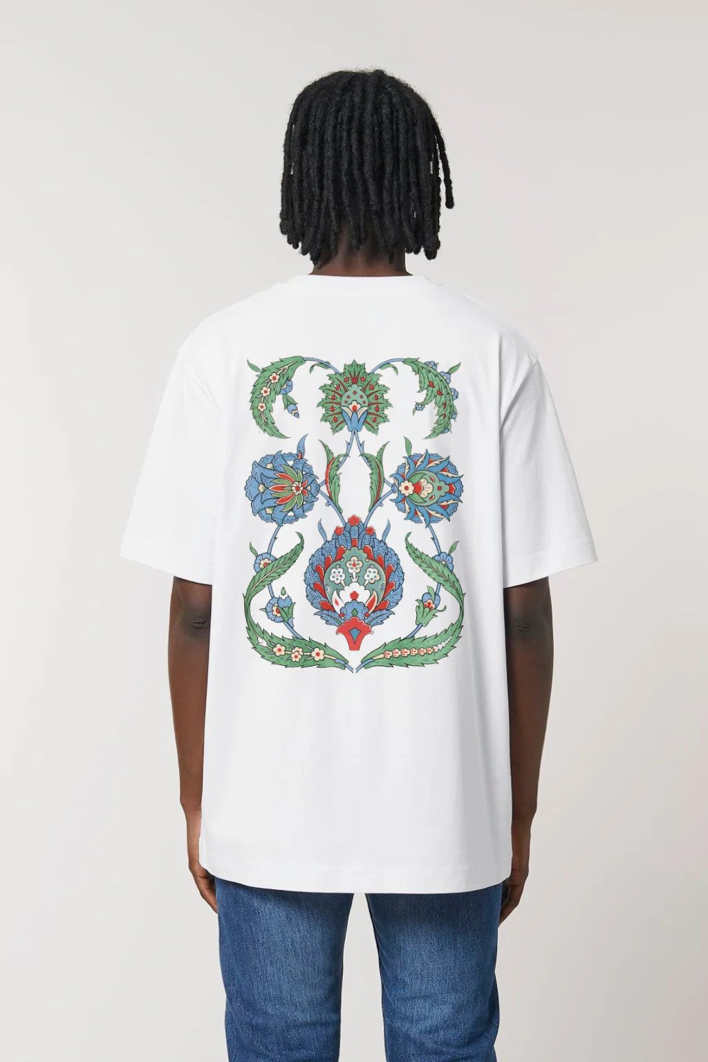 1. Men's white Hopera t-shirt featuring 'La Decoration Arabe' design by Emile Prisse d'Avennes, shown from the back in a studio setting