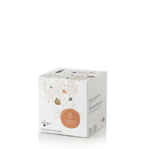 4. Packaging of La Rochère Orange Blossom Bee Candle featuring floral and bee illustrations