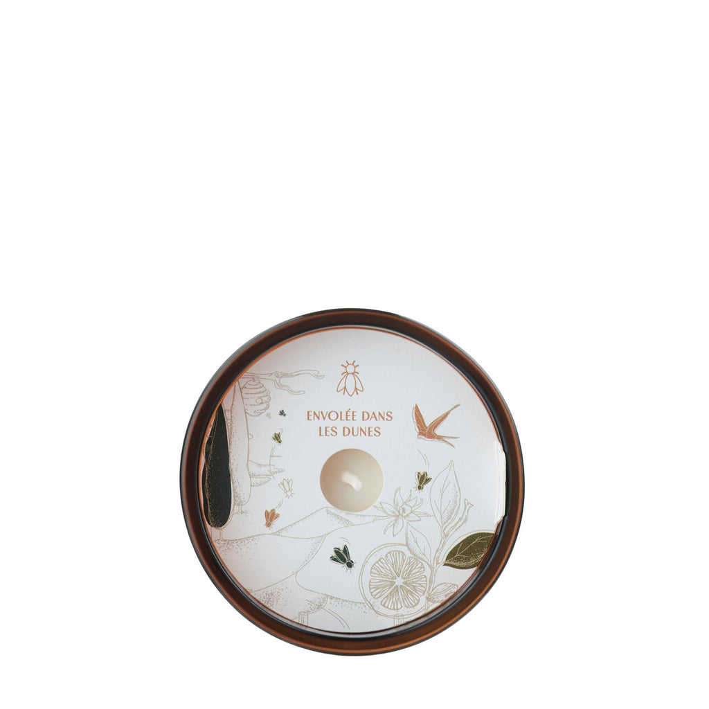 5. Top view of La Rochère Orange Blossom Bee Candle showing decorative lid design