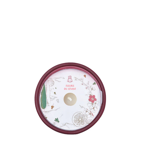 4. Top view of Cherry Blossom Bee Candle by La Rochère, featuring Fleurs du Levant design on lid