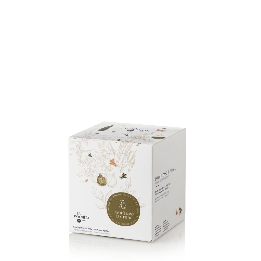 4. Packaging of La Rochère Fig Bee Candle with Envolée Dans Le Verger design and fig illustration