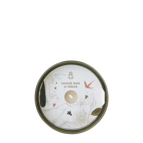 3. Top view of La Rochère Fig Bee Candle lid with Envolée Dans Le Verger design and floral illustrations